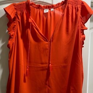 Gap size Large red orange flowy top.